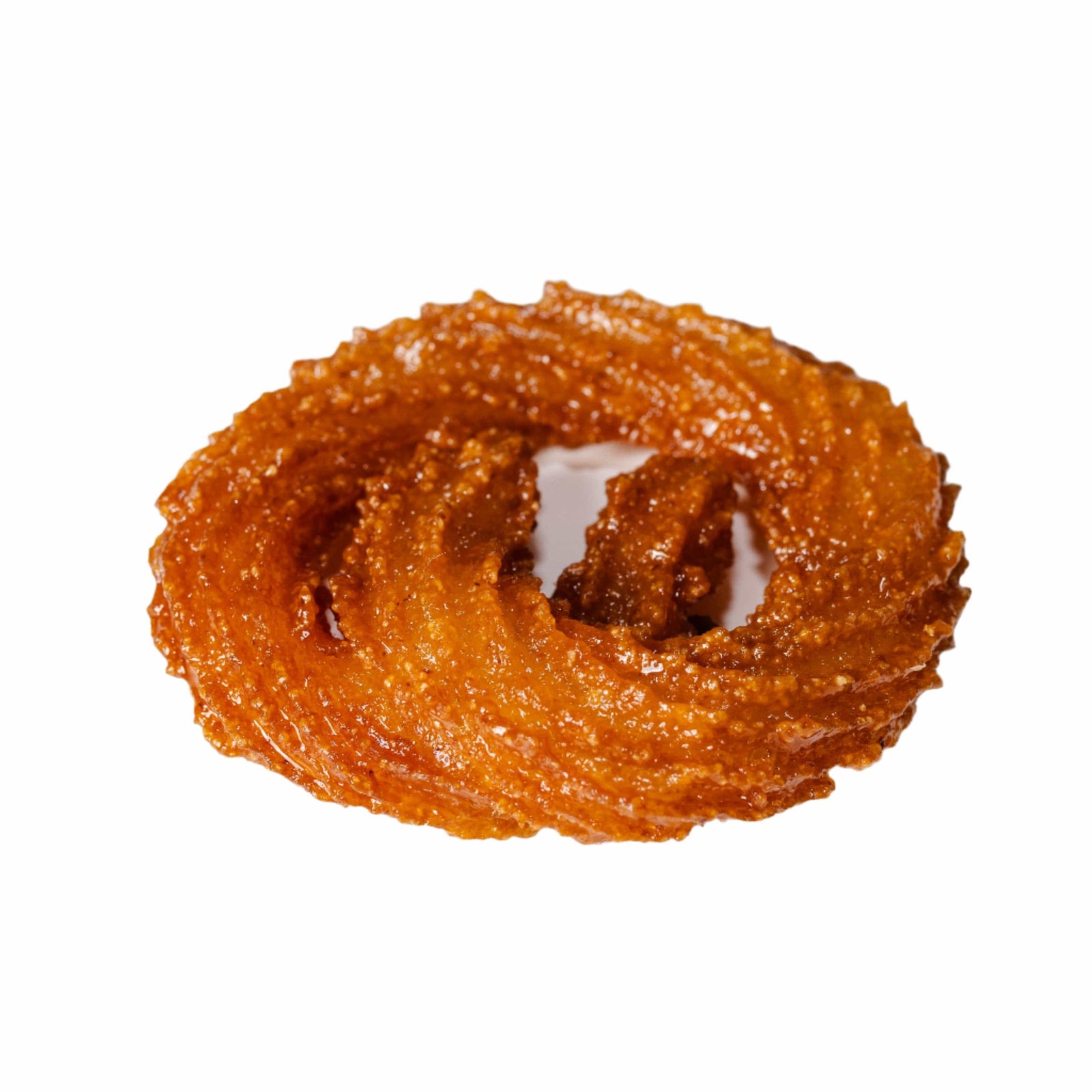 Mushabak Iraqi — golden crispy lacy fried batter in circular web shapes soaked in sugar syrup, traditional Iraqi sweet